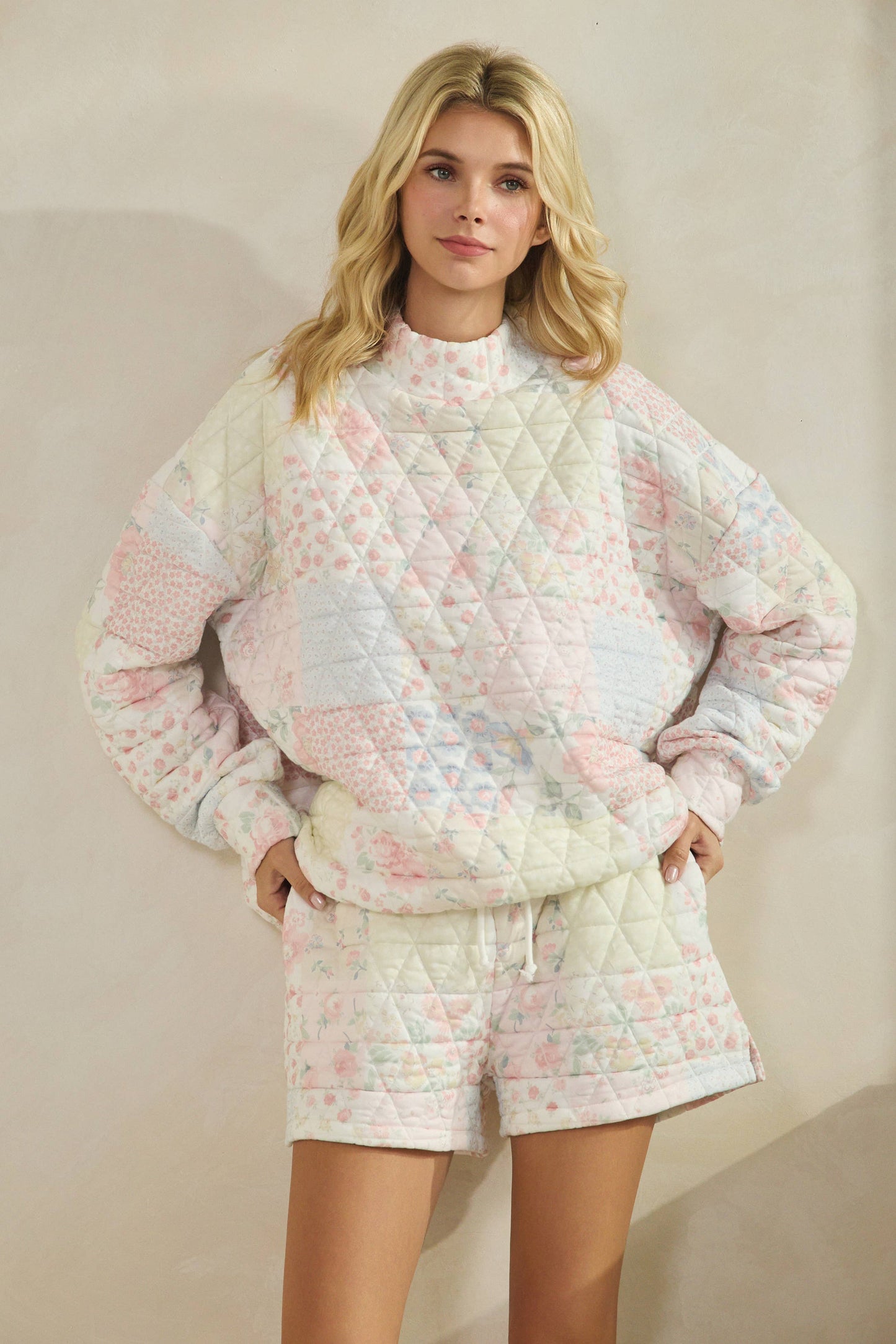 Floral textured mock neck sweater