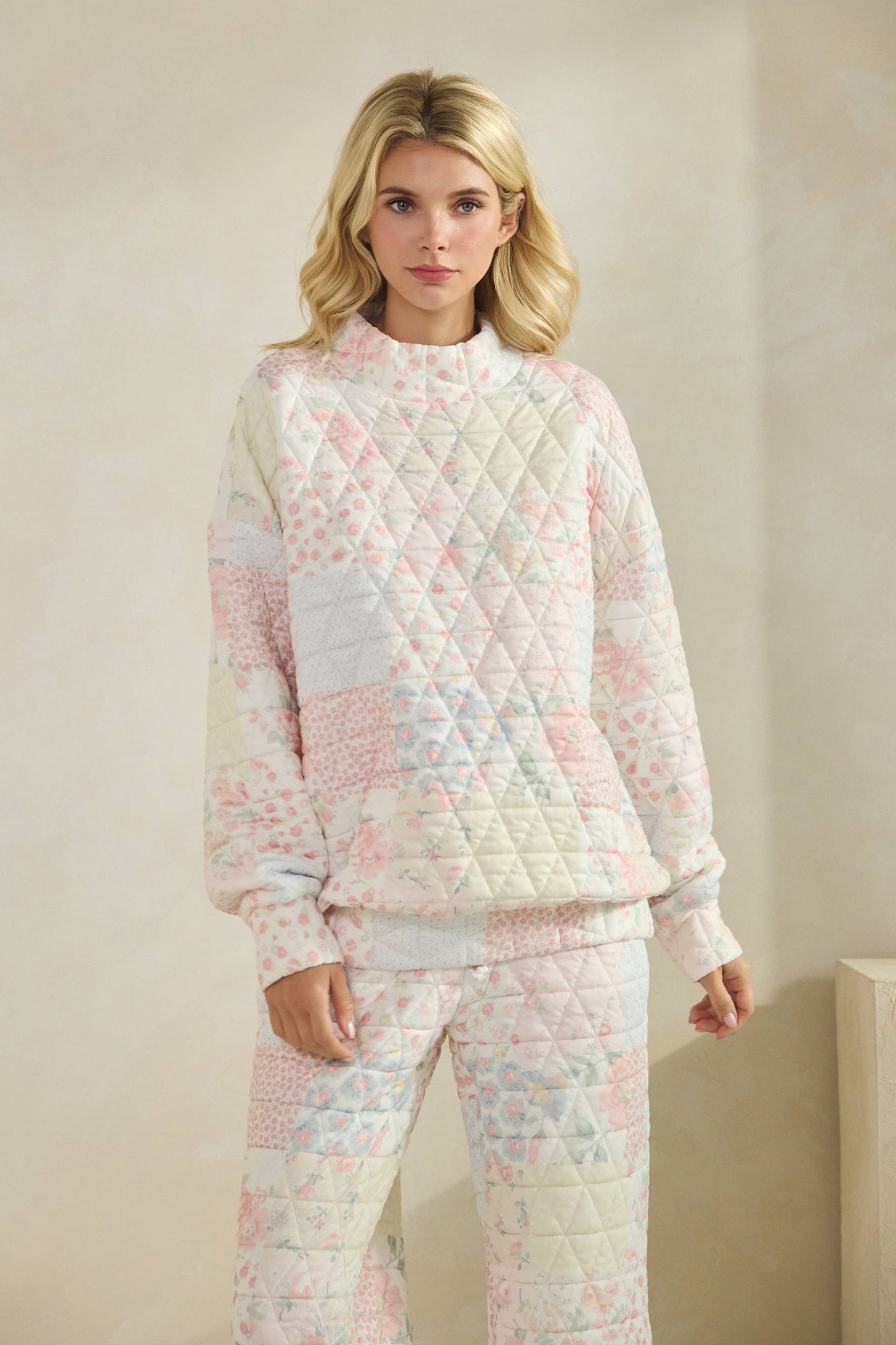 Floral textured mock neck sweater