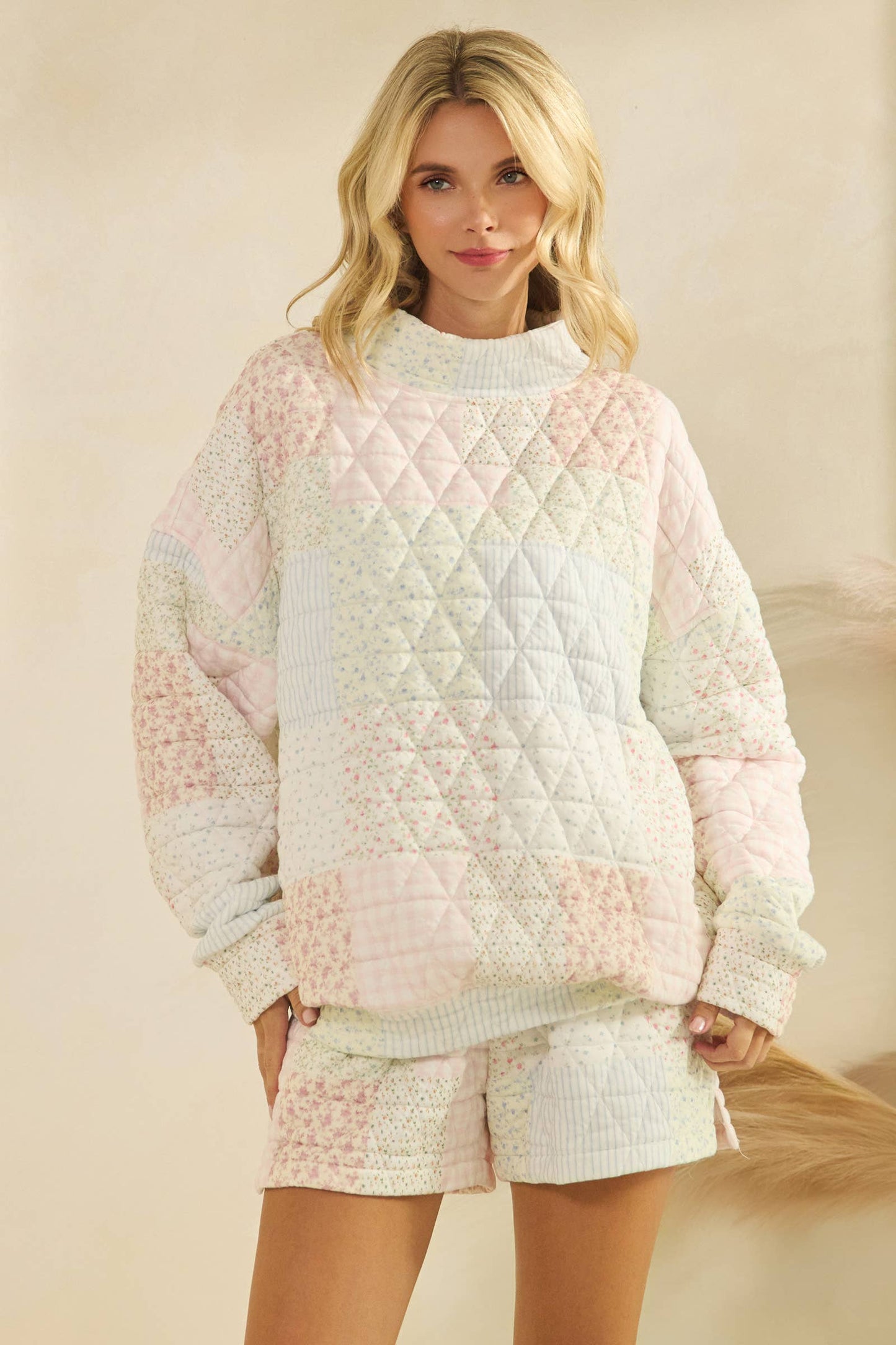 Floral textured mock neck sweater