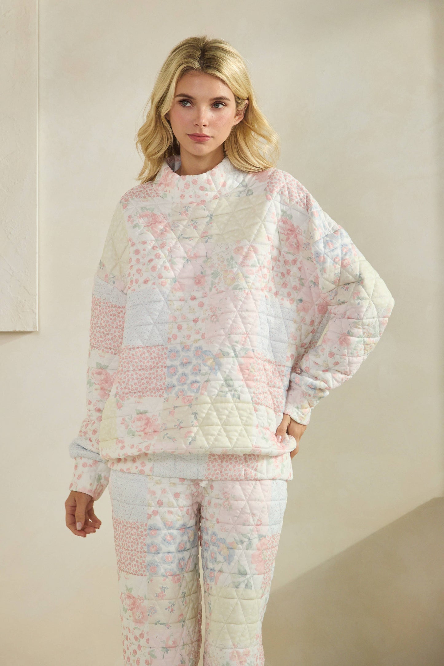 Floral textured mock neck sweater